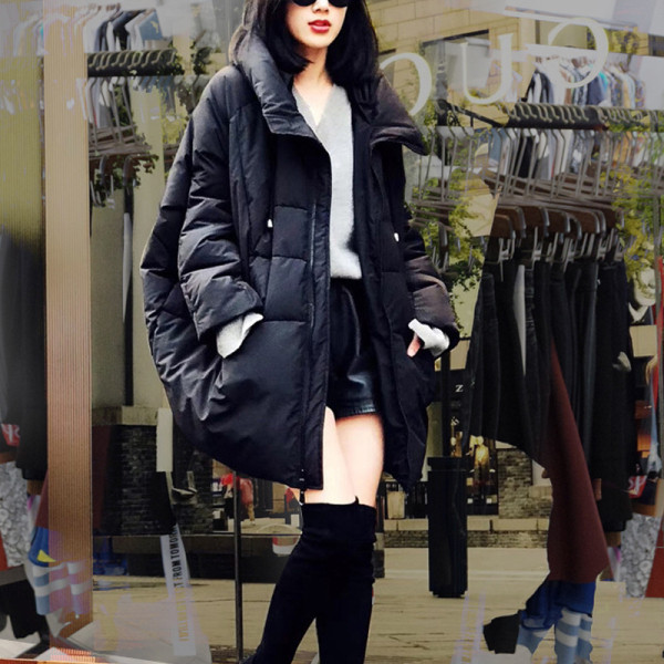 Női őszi-téli kabát széles modell fekete-fehér színben