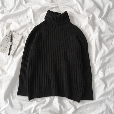 Modern női pulóver fekete-fehér színben pólógallérral