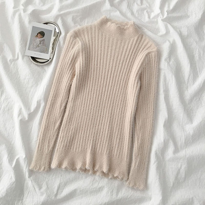 Női pehelypulóver fekete, rózsaszín, kék és bézs színben, pólógallérral