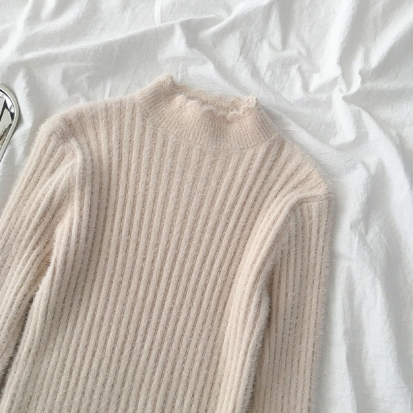 Női pehelypulóver fekete, rózsaszín, kék és bézs színben, pólógallérral