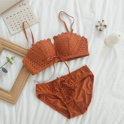 Μοντέρνο γυναικείο σετ σουτιέν και μπικίνι σε πορτοκαλί, γκρι και μαύρο χρώμα