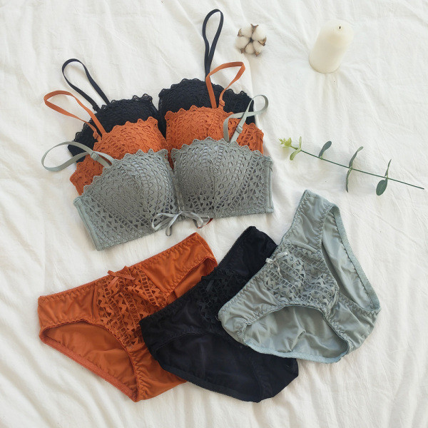 Μοντέρνο γυναικείο σετ σουτιέν και μπικίνι σε πορτοκαλί, γκρι και μαύρο χρώμα