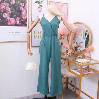 Modern női jumpsuit spitz nyakkivágással és csupasz háttal piros, kék, sárga és fekete színekben