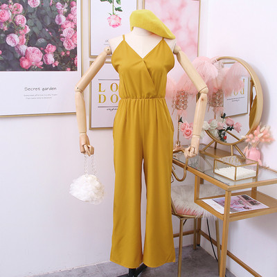 Modern női jumpsuit spitz nyakkivágással és csupasz háttal piros, kék, sárga és fekete színekben