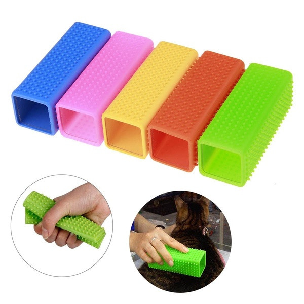 Soft silicone brush for removing pet hair in yellow, green, pink, orange and blue
