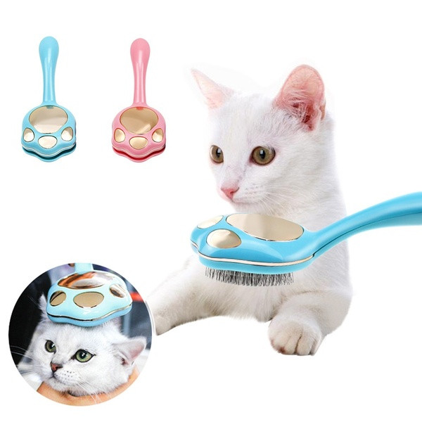 Plastic brush for combing cats in blue and pink