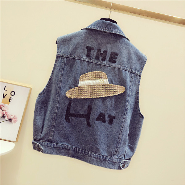 Női farmermellény, hátoldalán kék színben hímzéssel