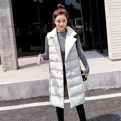 Női modern mellény hosszú modell spitz nyakkivágással fehér és fekete színben