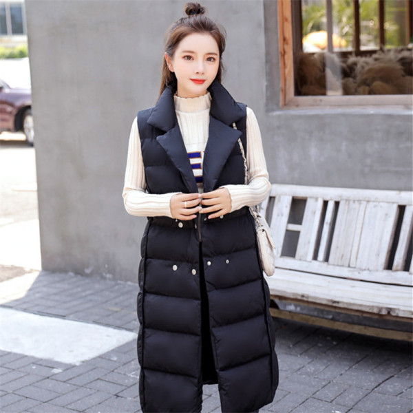 Női modern mellény hosszú modell spitz nyakkivágással fehér és fekete színben