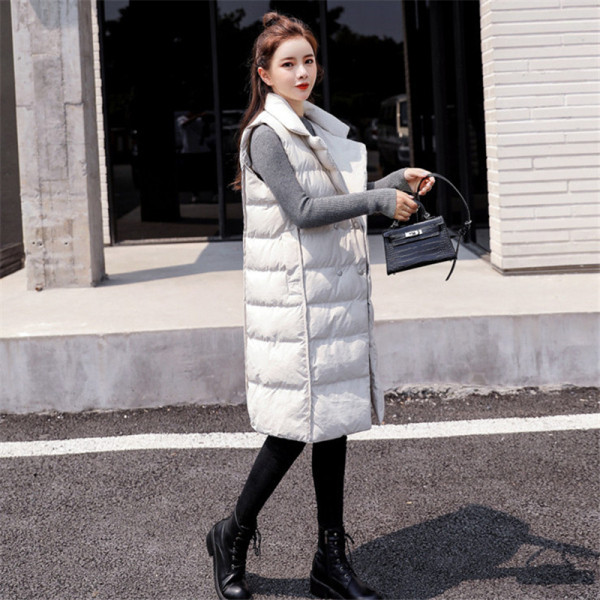 Női modern mellény hosszú modell spitz nyakkivágással fehér és fekete színben