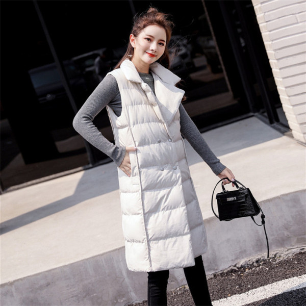 Női modern mellény hosszú modell spitz nyakkivágással fehér és fekete színben