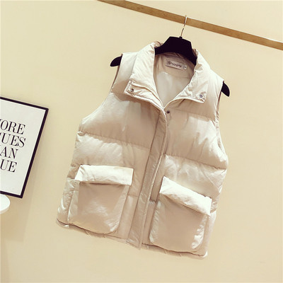 Női alkalmi mellény fehér és fekete zsebekkel