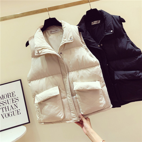 Női alkalmi mellény fehér és fekete zsebekkel