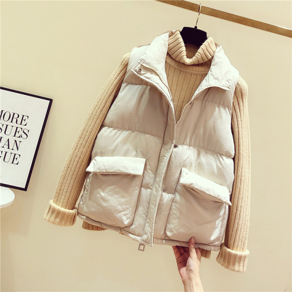 Női alkalmi mellény fehér és fekete zsebekkel