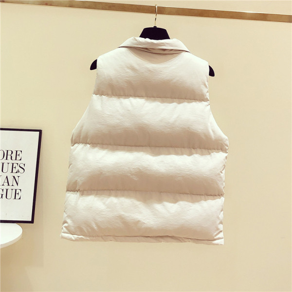 Női alkalmi mellény fehér és fekete zsebekkel