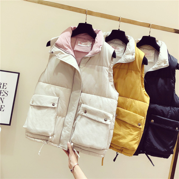 Női őszi-téli mellény sárga, fekete és fehér zsebekkel