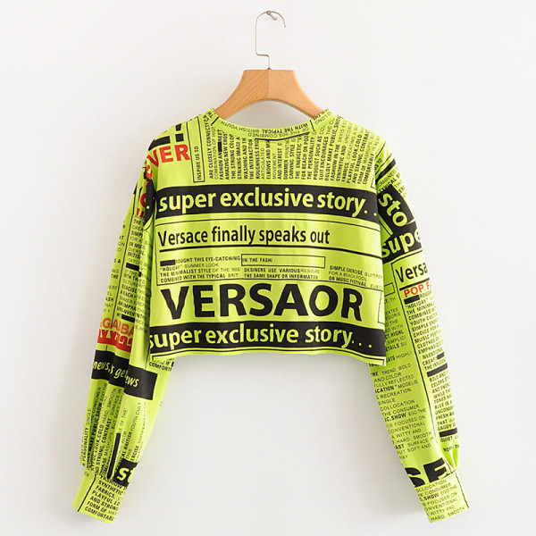 Modern rövid blúz, hosszú ujjú zöld, narancssárga és fehér feliratokkal