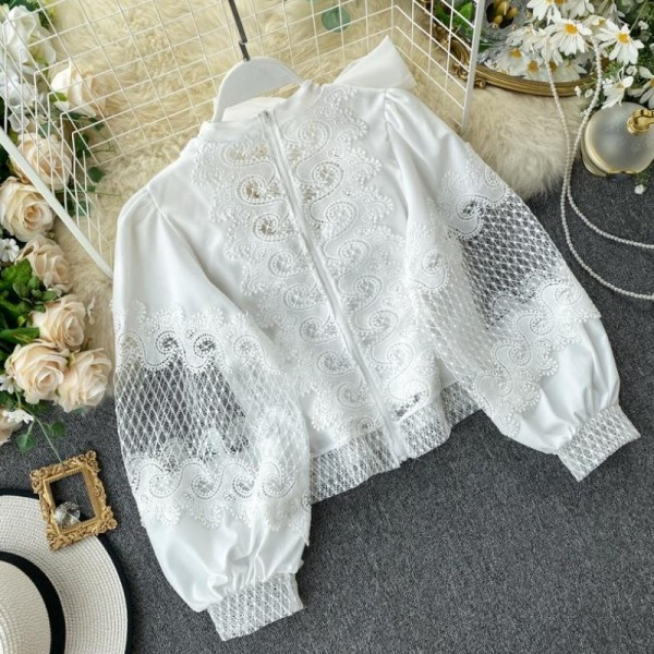 Új modell női blúz csipkével és szalaggal, fehér és fekete színben