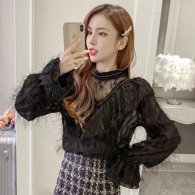 Női ing fekete, bézs és fehér színben alacsony gallérral és bojttal