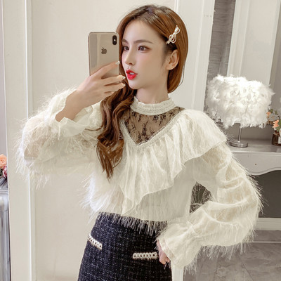 Női ing fekete, bézs és fehér színben alacsony gallérral és bojttal