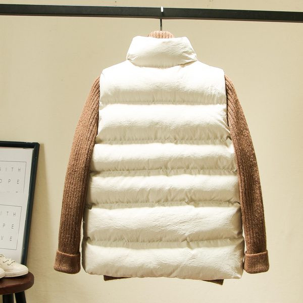 Női alkalmi mellény kerek nyakkivágással, fekete-fehér színben