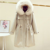 Women`s winter jacket long model with a connection at the waist and down on the hood in beige, black and green