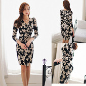 Elegáns női ruha 7/8-as ujjal és spitz nyakkivágással - aszimmetrikus modell