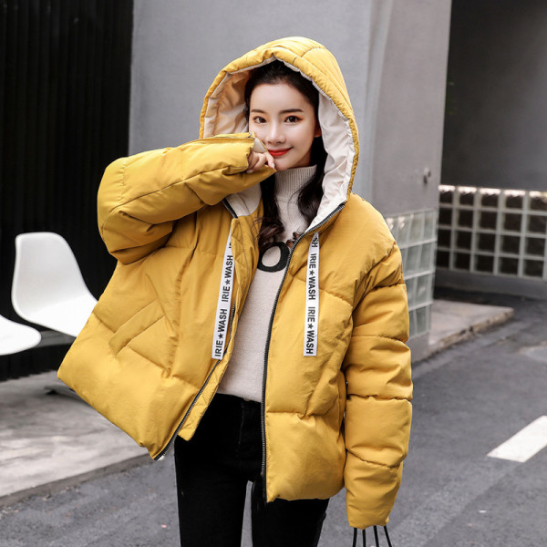 Női téli kabát kapucnival - széles modell sárga, rózsaszín és bézs színben