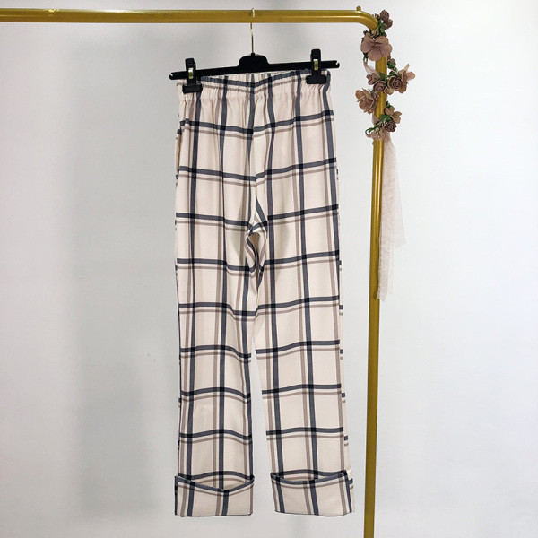 Hosszú, kockás nadrág elasztikus derékkal, fehér színben