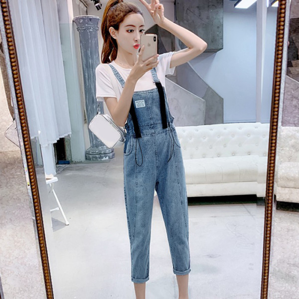 Új modell női farmer overál kék színben, derékban megkötővel