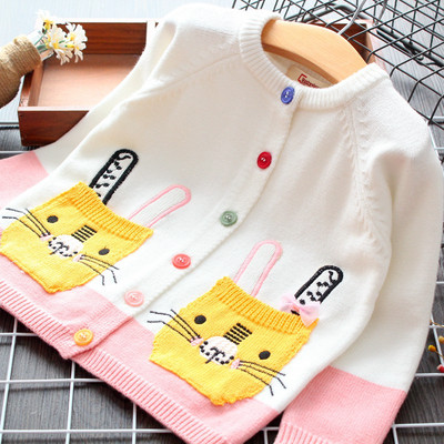 Új modell gyerekkardigán színes gombokkal és fehér hímzéssel lányoknak