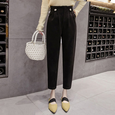 Női alkalmi nadrág fekete és bézs színben, zsebekkel és magas derékkal