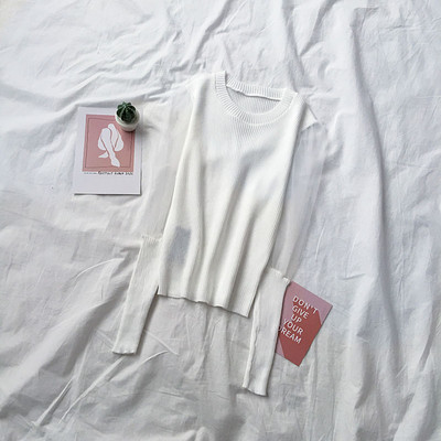 Női pulóver zöld, fehér, fekete és barna színben, az ujjakon tüll