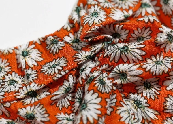 Γυναικείο καλοκαιρινό φόρεμα με βολάν και λεπτό ιμάντα ώμου σε πορτοκαλί χρώμα 