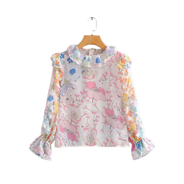 Női alkalmi blúz fürtökkel, fehér és virágmintával