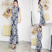 Rochie de damă elegantă, cu model, decolteu oval și decupaje în albastru