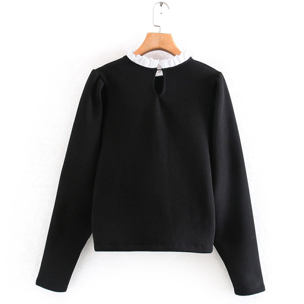 Fekete színű női alkalmi blúz puffos ujjakkal és fürtökkel