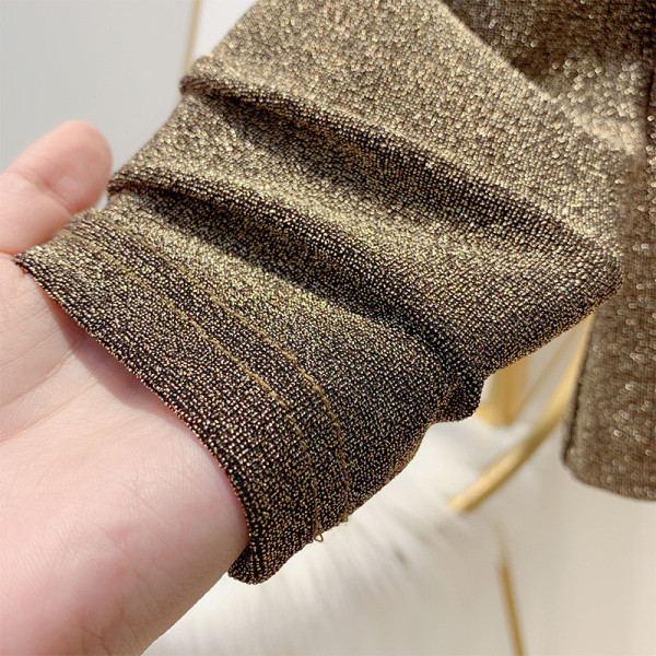 Fényes hatású női blúz félmagas gallérral arany, ezüst és fekete színben