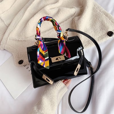 Női táska színes rövid füllel, fém rögzítéssel bordó, barna, piros és fekete színekben