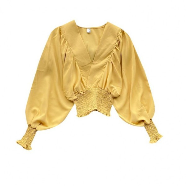 Modern női blúz spitz nyakkivágással és széles ujjakkal több színben