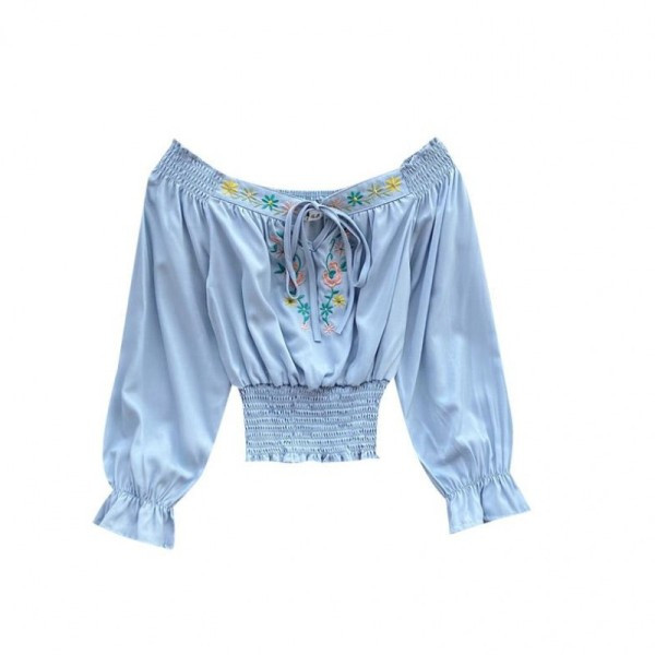 Új modell női blúz csónakos nyakkivágással, nyakkendőkkel és kék hímzéssel