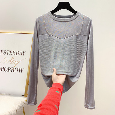 Modern női blúz kerek nyakkivágással, fekete, fehér és szürke kövekkel