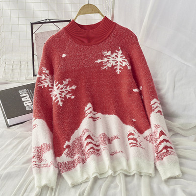 Női téli pulóver, piros és kék karácsonyi motívumokkal