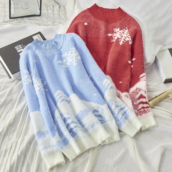 Női téli pulóver, piros és kék karácsonyi motívumokkal