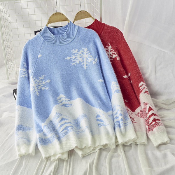 Női téli pulóver, piros és kék karácsonyi motívumokkal