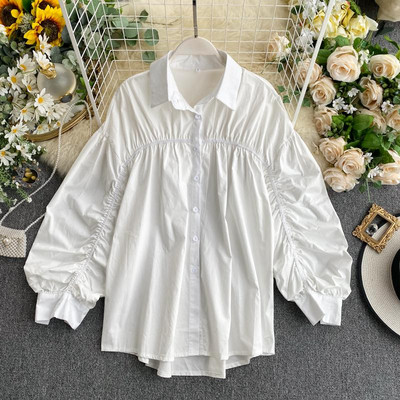 Modern női ing gombokkal és klasszikus galléros aszimmetrikus modell rózsaszín, fehér, zöld és fekete színekben