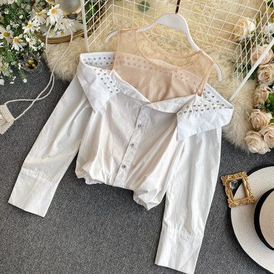 Camasa de dama model nou cu umerii goi si nasturi in alb si negru