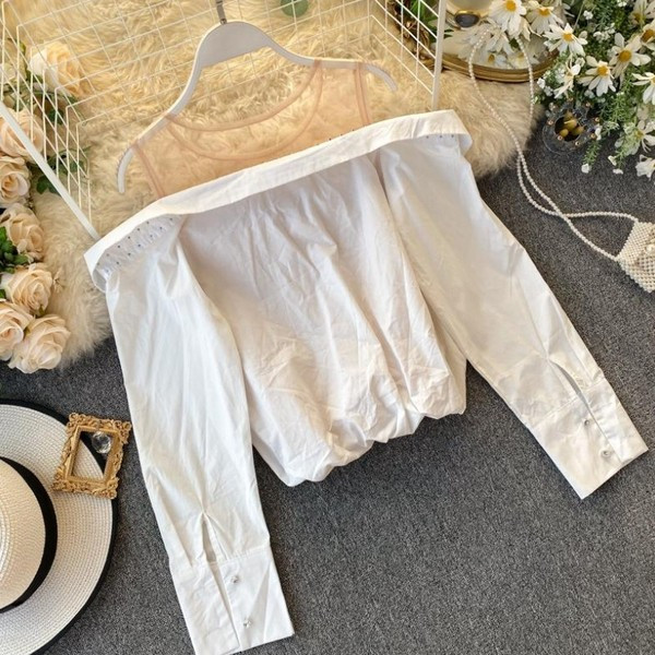 Camasa de dama model nou cu umerii goi si nasturi in alb si negru