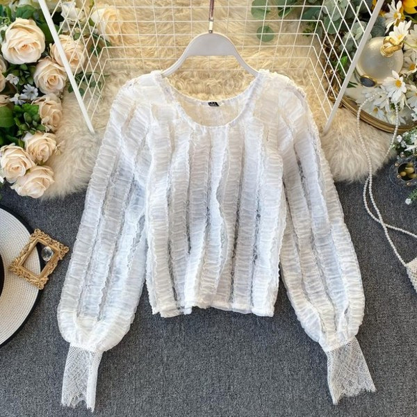 Modern női blúz ovális nyakkivágással és hosszú ujjú zöld, fehér és fekete színben