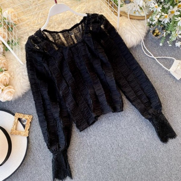 Modern női blúz ovális nyakkivágással és hosszú ujjú zöld, fehér és fekete színben